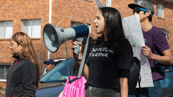 Girl with megaphone at a protest