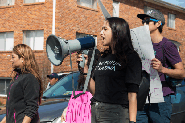 Girl with megaphone at a protest