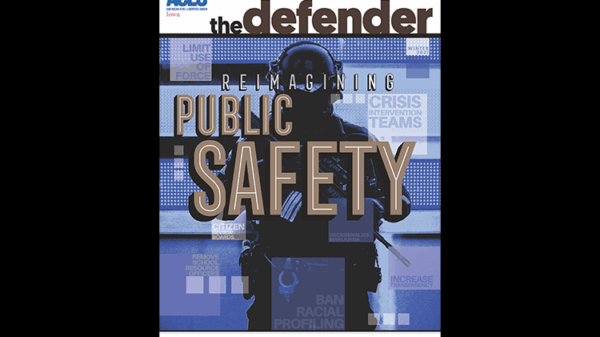 This Winter 2021 cover of The Defender shows a police officer holding a weapon.