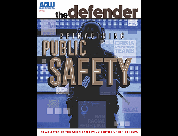 This Winter 2021 cover of The Defender shows a police officer holding a weapon.