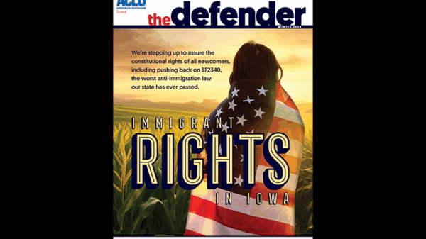 The Winter 2024 cover of the Defender shows a person wrapped in an American flag in a cornfield at sunset.