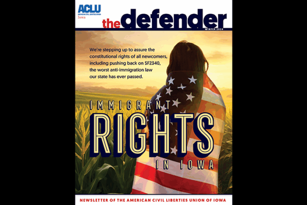 The Winter 2024 cover of the Defender shows a person wrapped in an American flag in a cornfield at sunset.